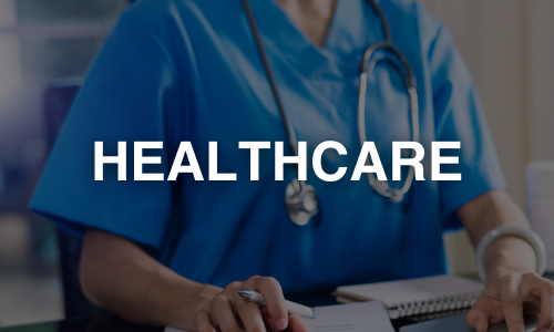 Closeup of healthcare professional wearing blue scrubs